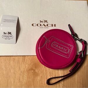 Coach Fuchsia Round leather Wristlet wallet silver embossed design NEW